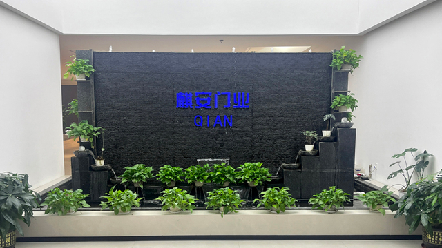Qi An company sign wall for certified fire doors and acoustic doors manufacturer